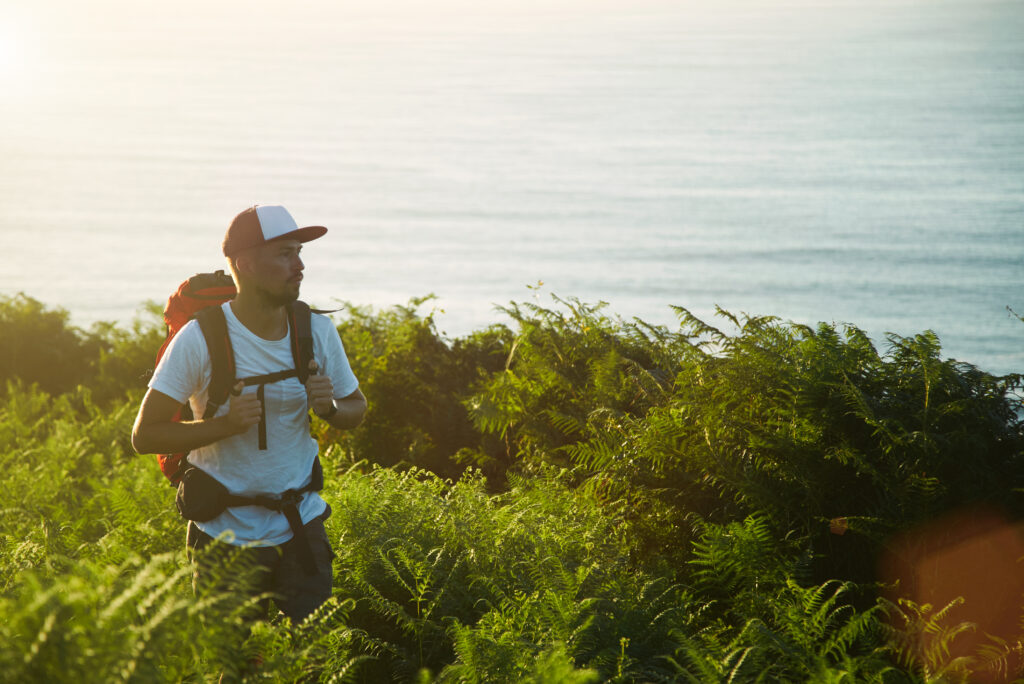 Backpaker Hiking Hills Near Sea 1024x684